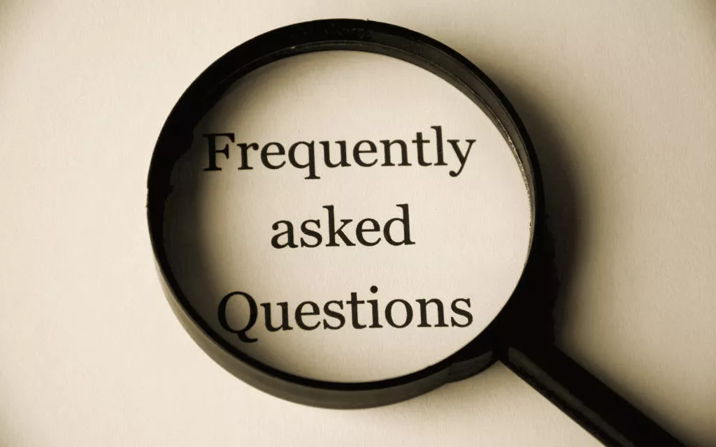 A magnifying glass on frequently asked questions